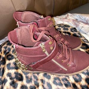 Burgundy and gold shoe almost like a sneaker